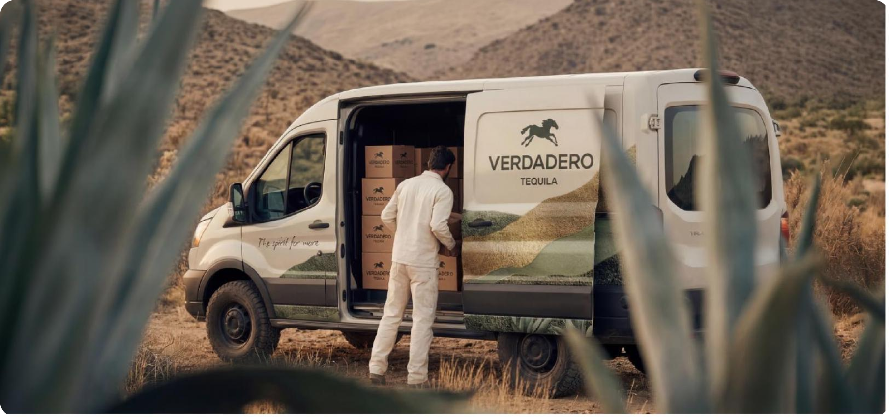 A person stepping into a branded van — the collaboration between a designer and a client whose starting point came from AI
