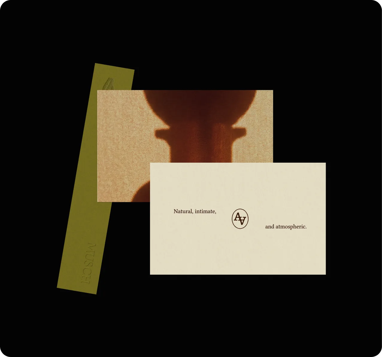 Alma di Alba — business card mockup reading 'Natural, intimate, and atmospheric' with the brand monogram