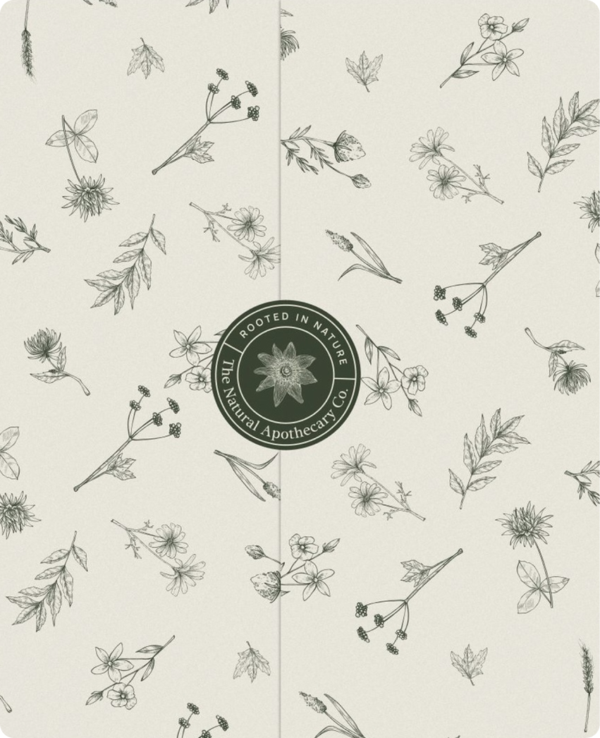 The Natural Apothecary — branded shopping bag with botanical illustration