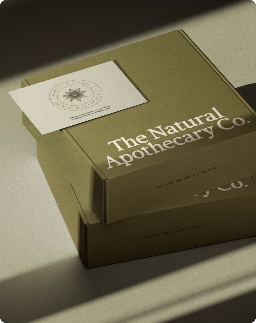 The Natural Apothecary — branded shopping bag with botanical illustration