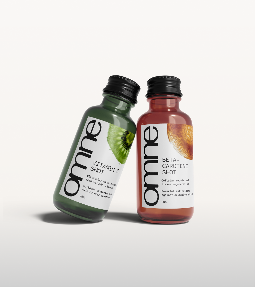 Omne — campaign portrait of a person drinking a longevity shot