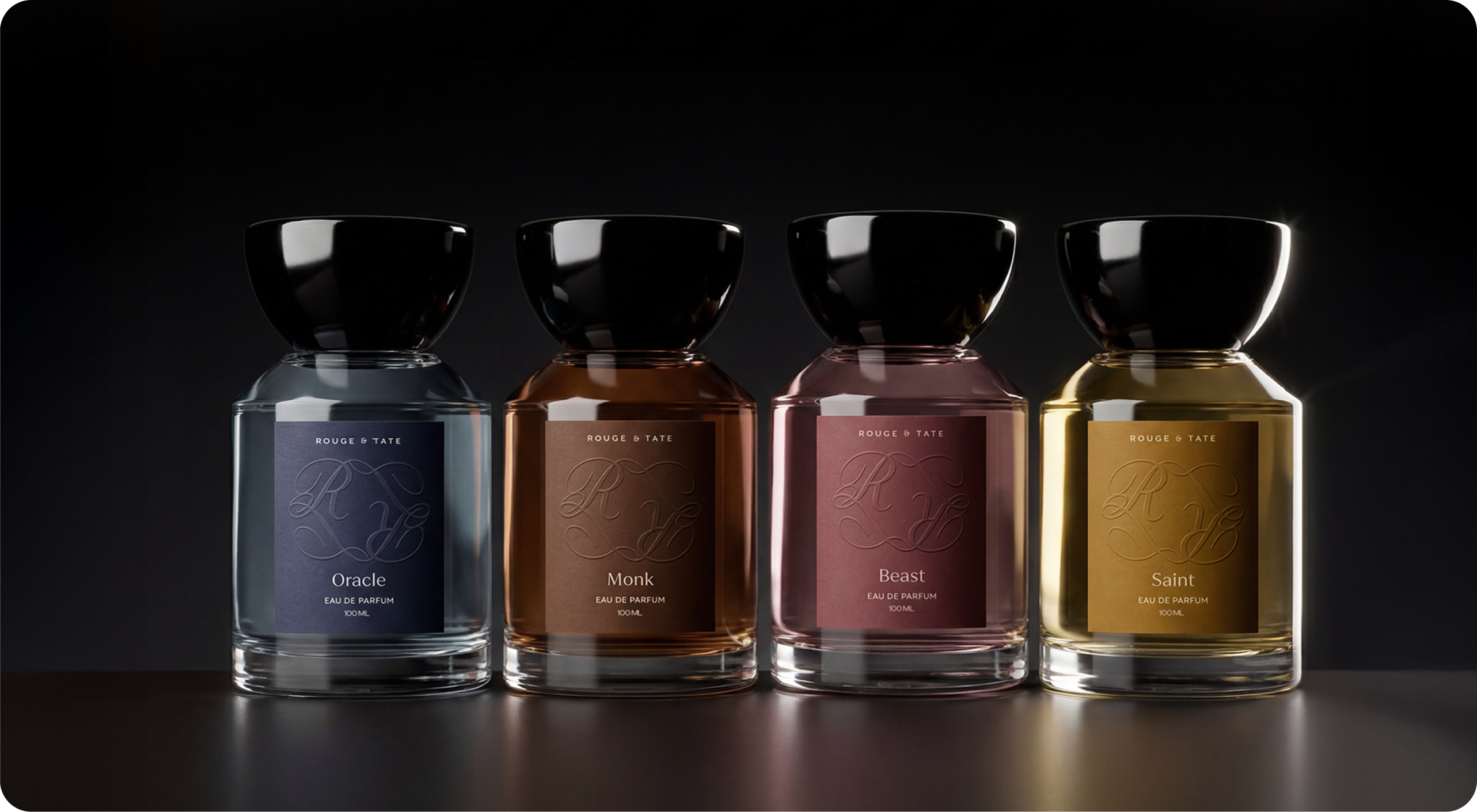Rouge & Tate — Beast bottle and its embossed box staged in atmospheric pink light, monogram catching the highlight